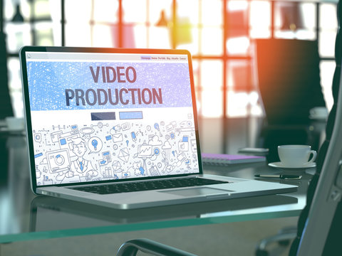 Video Production Concept. Closeup Landing Page on Laptop Screen in Doodle Design Style. On Background of Comfortable Working Place in Modern Office. Blurred, Toned Image. 3D Render.