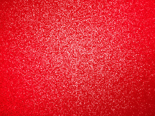 festive sparkling red glitter background texture with a highlight in the center (3D illustration)