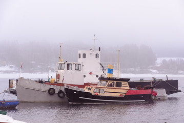 Scandinavian landscape with traditional Norwegian boats