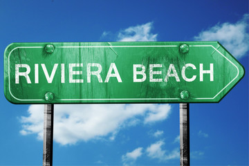 riviera beach road sign , worn and damaged look