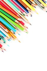 Drawing colourful pencils on a white background, close up