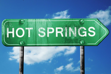 hot springs road sign , worn and damaged look