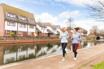 Two girls jogging outdoors in London