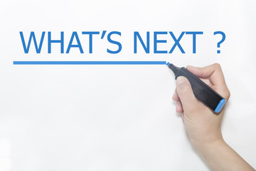 what is next words written by hand on white background