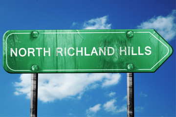 north richland hills road sign , worn and damaged look