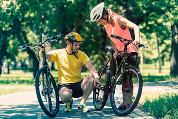 Young couple with bicycles