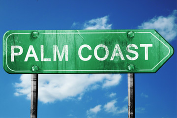 palm coast road sign , worn and damaged look