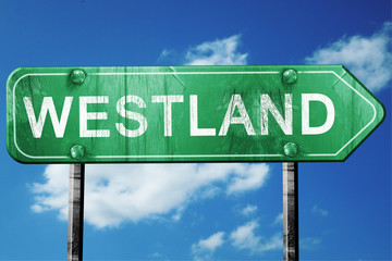 westland road sign , worn and damaged look