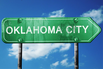 oklahoma city road sign , worn and damaged look