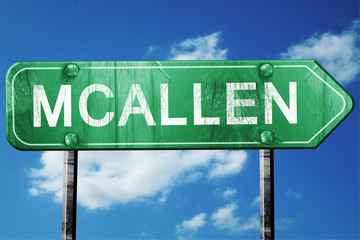 mcallen road sign , worn and damaged look