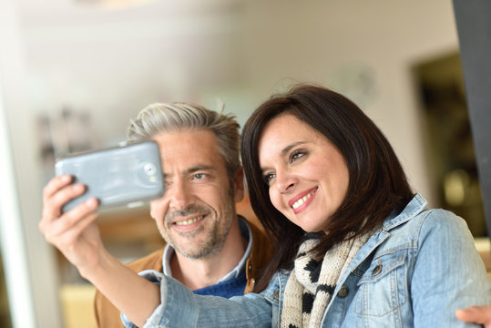 Mature couple taking selfie picture