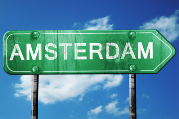 amsterdam road sign , worn and damaged look