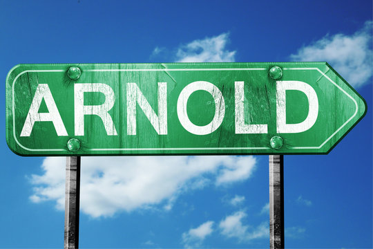 arnold road sign , worn and damaged look