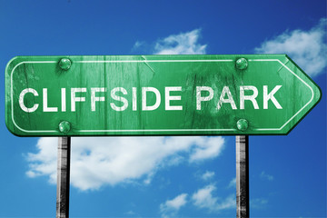 cliffside park road sign , worn and damaged look