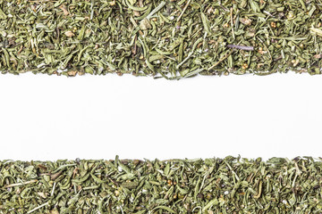 Dried savory herb isolated on white.