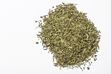 Dried savory herb isolated on white.