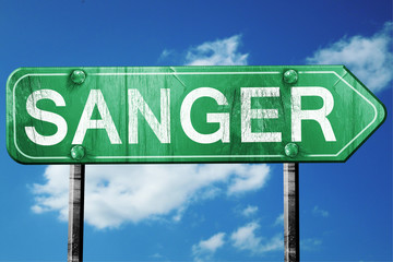 sanger road sign , worn and damaged look
