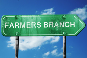 farmers branch road sign , worn and damaged look