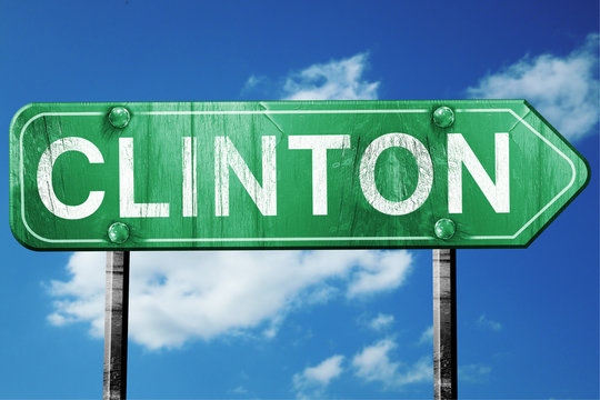 clinton road sign , worn and damaged look