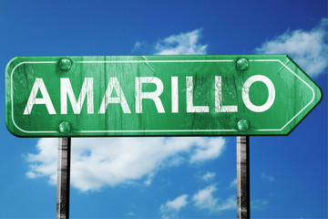 amarillo road sign , worn and damaged look