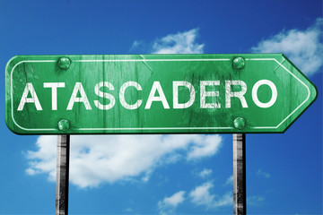 atascadero road sign , worn and damaged look