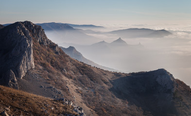 Fototapeta na wymiar The mountains at dawn in the mist