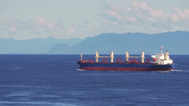 Dry Goods Cargo Ship Pacific Ocean. All logos and ID info removed.