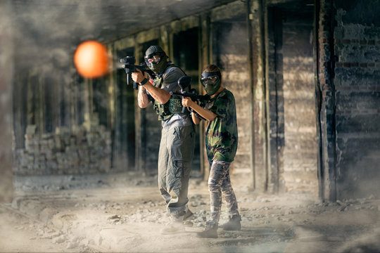 paintball team together in action