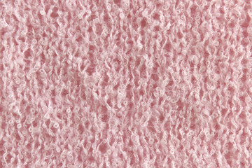 Pink textured yarn hand knit background