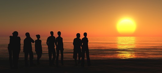 Fototapeta premium Menschen am Strand bei Sonnenuntergang