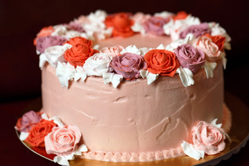 Birthday cake with red roses.
