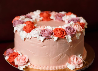 Birthday cake with red roses.