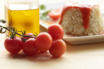 cherrys tomatoes on wooden background.