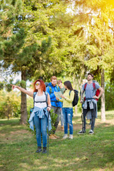 Obraz premium First in group of hiker show the way