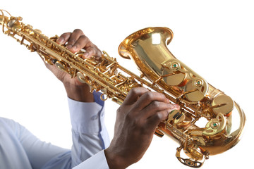 African American jazz musician playing the saxophone, isolated on white