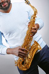 African American jazz musician playing the saxophone