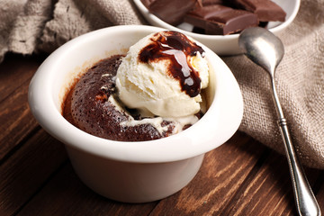 Served table of chocolate lava cake with ice-cream