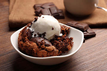 Served table of chocolate lava cake with ice-cream
