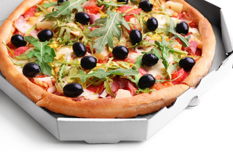 Fresh pizza in carton box  closeup