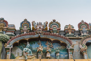 Trichy, India - October 15, 2013: Closeup of a statue scenery at Ranganathar Temple showing Lord Rama mapping the attack on Lanka to liberate his wife Sita, in front of his brother Lakshman, Hanuman.