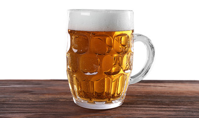 Glass of beer on white background