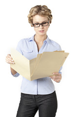 office girl reading a folder of files