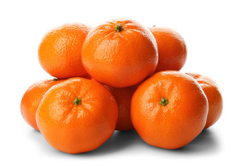 A pile of fresh tangerines isolated on white background, close up