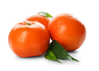 Three fresh tangerines isolated on white background, close up