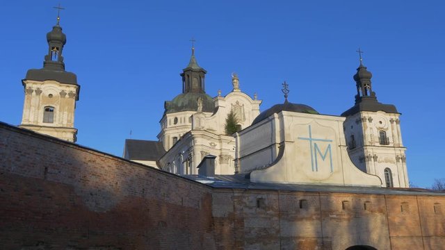 Barefoot Carmelites Monastery Camera Hides Behind a Wall Berdichev Catholic Protective Walls of Church Towers Barocco Style Ancient Building Sunny Blue Sky