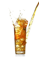 Fresh iced tea pouring in a glass