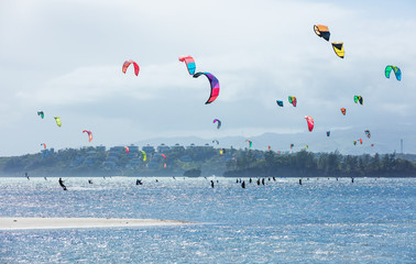 Kitesurfers enjoying wind power on Bulabog beach, Boracay island, Philippines 