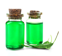 Bottles of tea oil, isolated on white