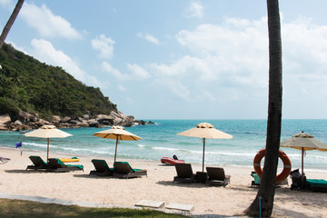 Chairs with table on the beach