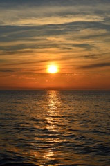 Fototapeta na wymiar Beautiful maroon sunset on lake Baikal.